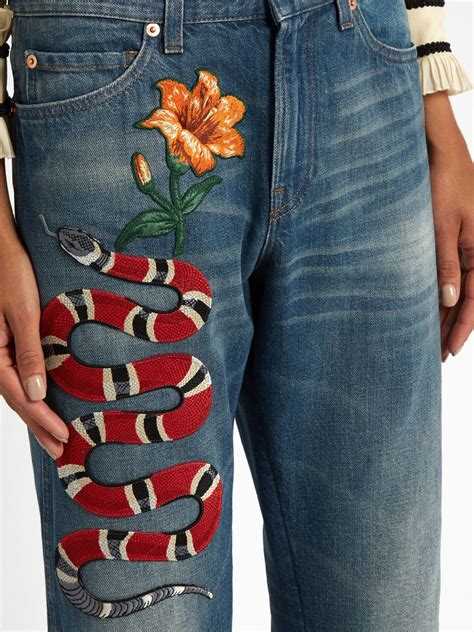 snake jeans gucci